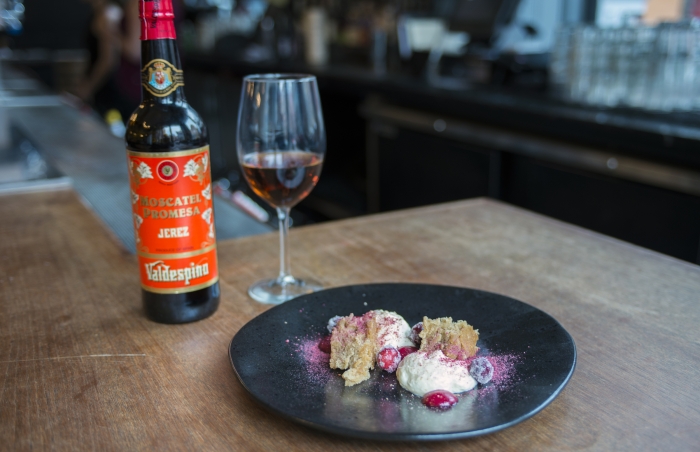 Whipped Moscatel Eggnog Anglaise,  Texas Peanut Butter Cake, Ginger-Orange Cranberries, Sparkling Cranberries paired with Moscatel