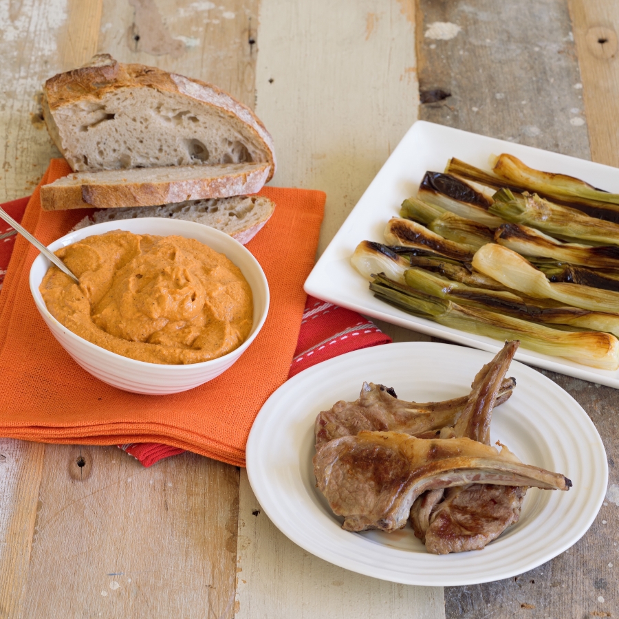 Lamb Cutlets with Romeso Sauce & Charred Spring Onions